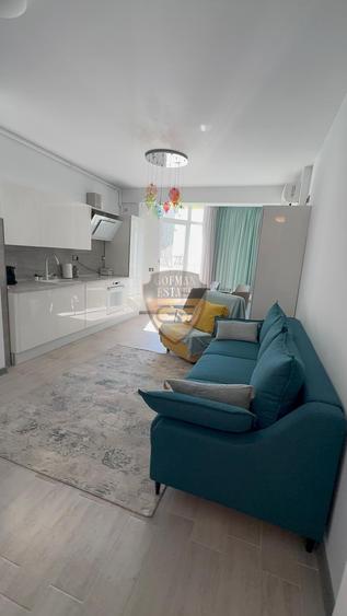 Apartament cu 3 camere semidecomandat, mobilat în Nord