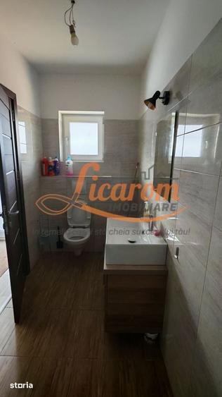 Casă cu 4 camere cu Teren 210 Mp în Central