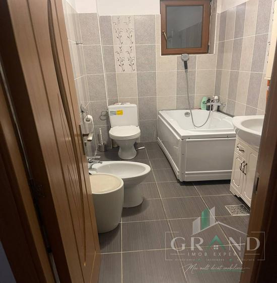 Apartament cu 2 camere semidecomandat, mobilat în Baciu
