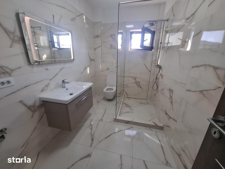 Casă cu 5 camere cu Teren 330 Mp în Tunari