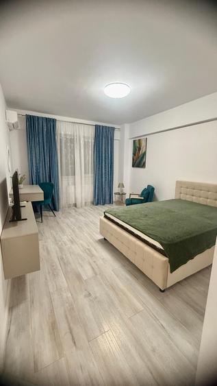 Garsonieră decomandată, mobilată în Podu Roș