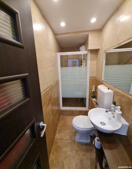 Apartament cu 4 camere decomandat în Tractorul