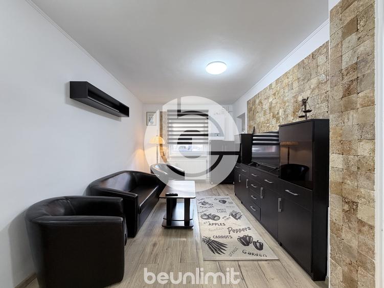 Apartament cu 3 camere semidecomandat, mobilat în Central
