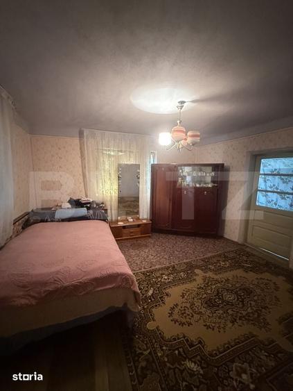 Casă cu 4 camere cu Teren 1000 Mp în Voinești
