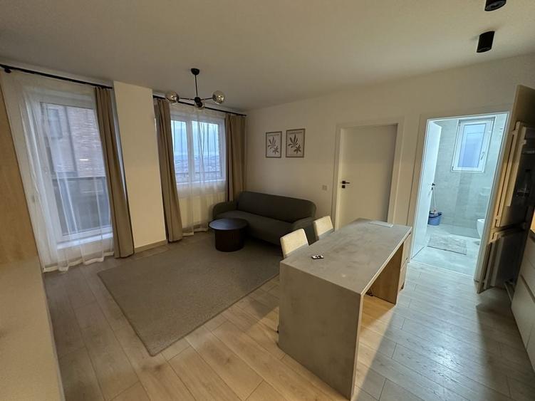 Apartament cu 2 camere semidecomandat în Chinteni