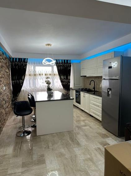 Apartament cu 3 camere semidecomandat, mobilat în Baciu