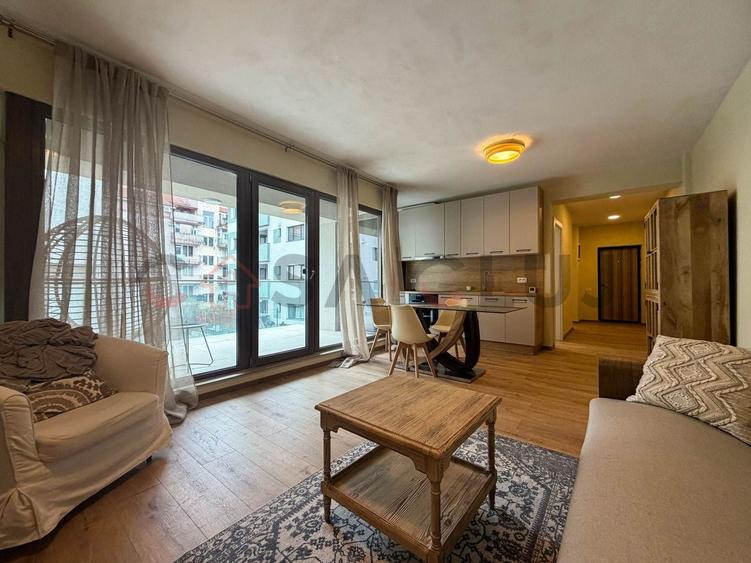 Apartament cu 3 camere semidecomandat, mobilat în Borhanci