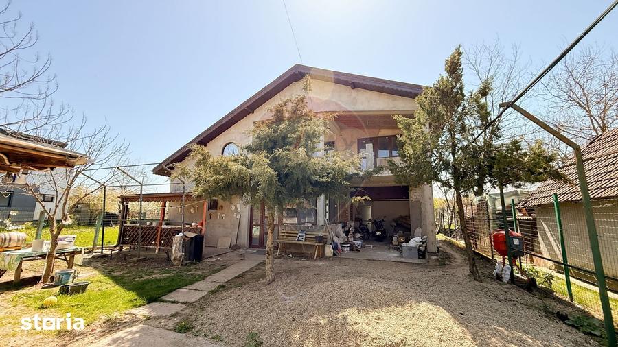 Casă cu 7 camere cu Teren 1592 Mp în Periș