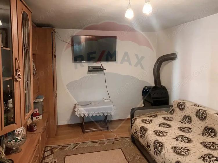 Casă cu Teren 1043 Mp în Dochia