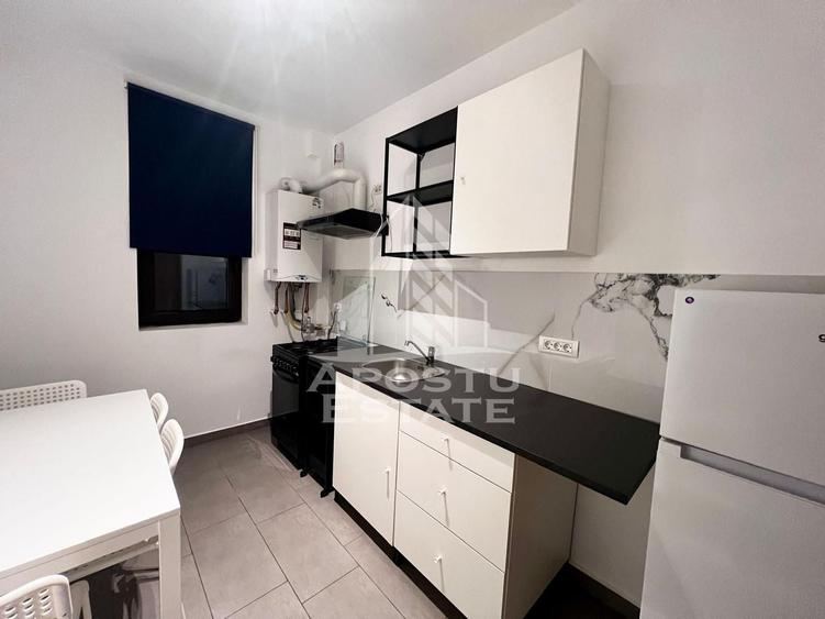 Apartament cu 2 camere semidecomandat, mobilat în Giroc