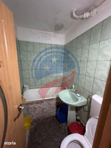 Apartament cu 3 camere în Calea București — fotografia 3