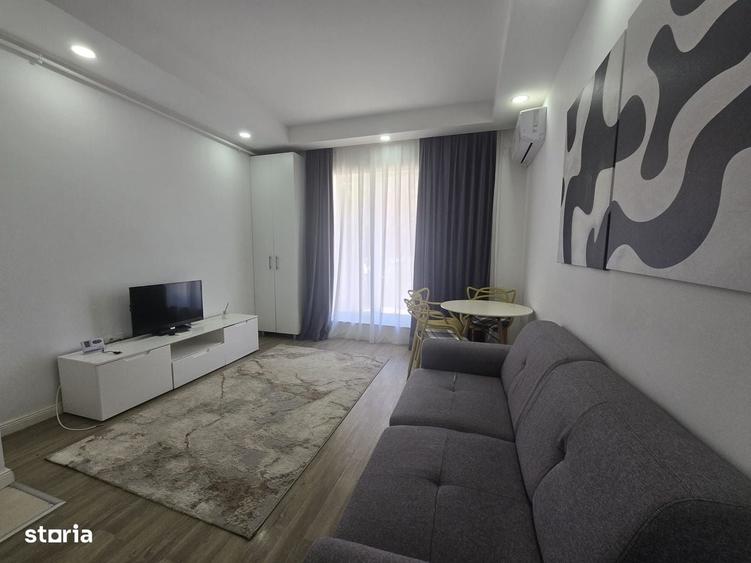 COSMOPOLIS - Apartament cu 2 camere si gradina, mobilat si utilat. - 2