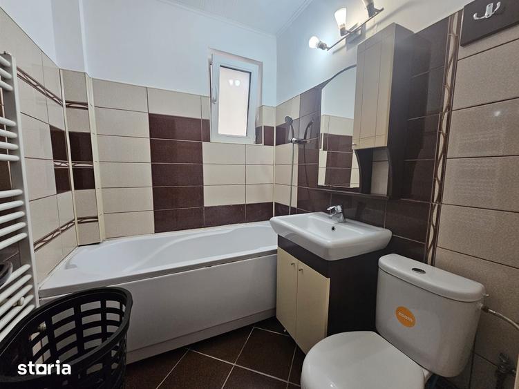 Apartament cu 2 camere semidecomandat în Podu Roș