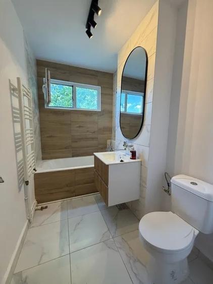 Apartament cu 3 camere semidecomandat, mobilat în Podu Roș