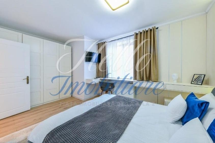 Apartament cu 3 camere semidecomandat, mobilat în Central