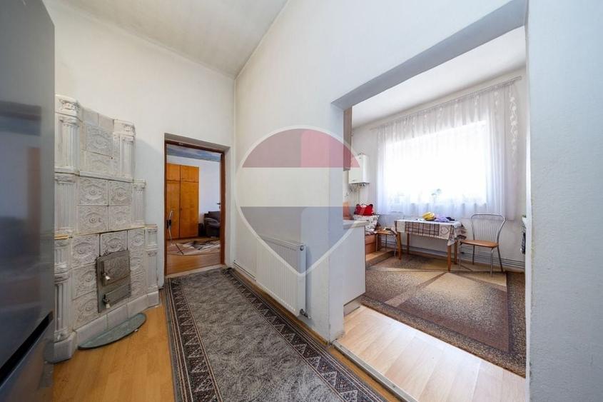 Casă individuală cu 6 camere cu Teren 1048 Mp în Satulung