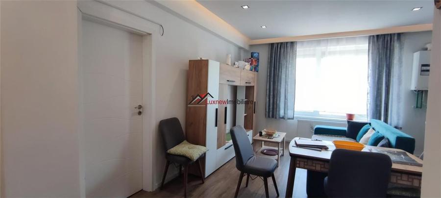 Apartament cu 2 camere, mobilat 45,6 mp utili plus balcon, garaj subteran zona T - 4