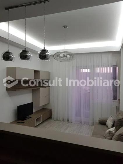 Apartament cu 2 camere semidecomandat, mobilat în Central