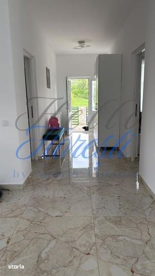 Casă cu 4 camere cu Teren 1500 Mp în Suatu