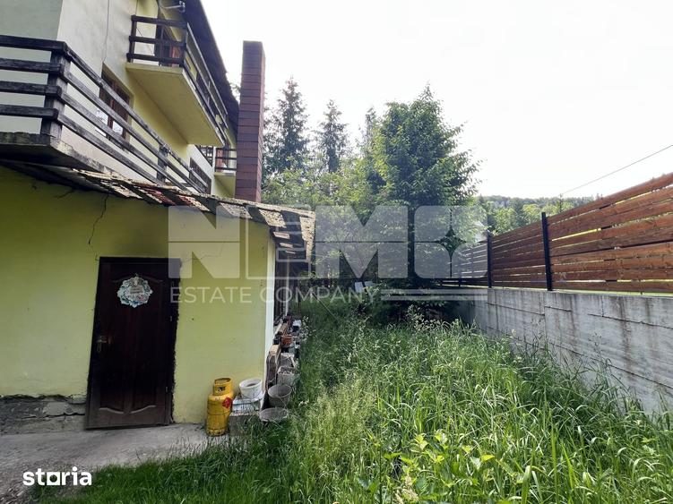 Casă cu 8 camere cu Teren 1950 Mp în Sucevița