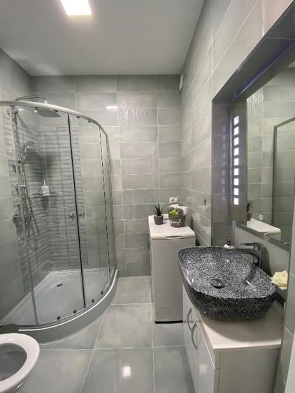 Apartament cu 2 camere semidecomandat, mobilat în Centrul Istoric