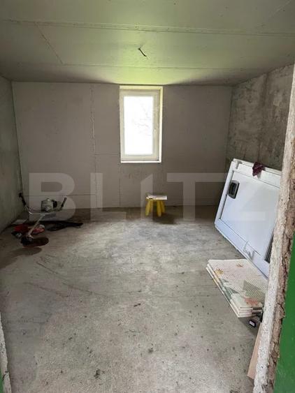 Casă individuală cu 2 camere cu Teren 1500 Mp în Dragșina