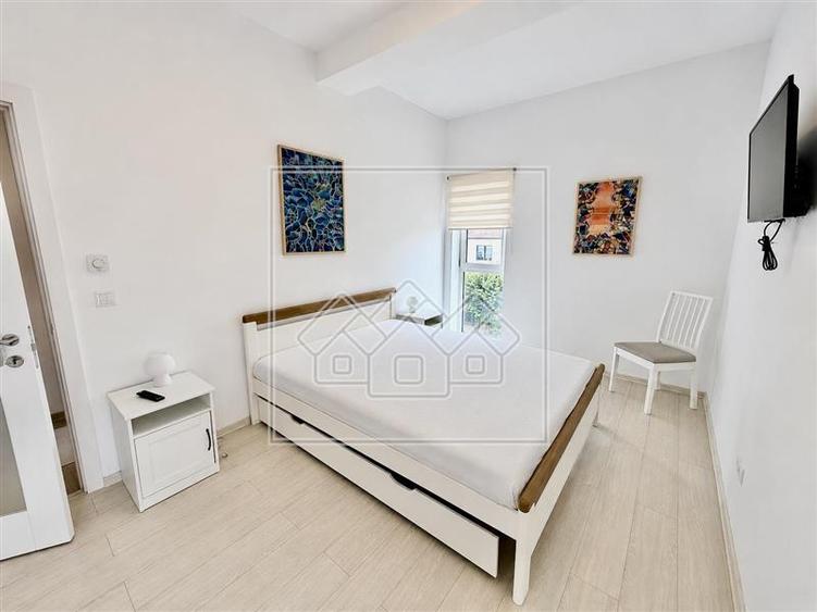 Apartament 3 camere de inchiriat, bloc nou, parcare subterana - langa Parcul Sub - 7