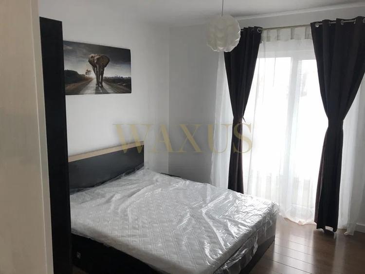 Apartament cu 2 camere semidecomandat, mobilat în Calea Moldovei