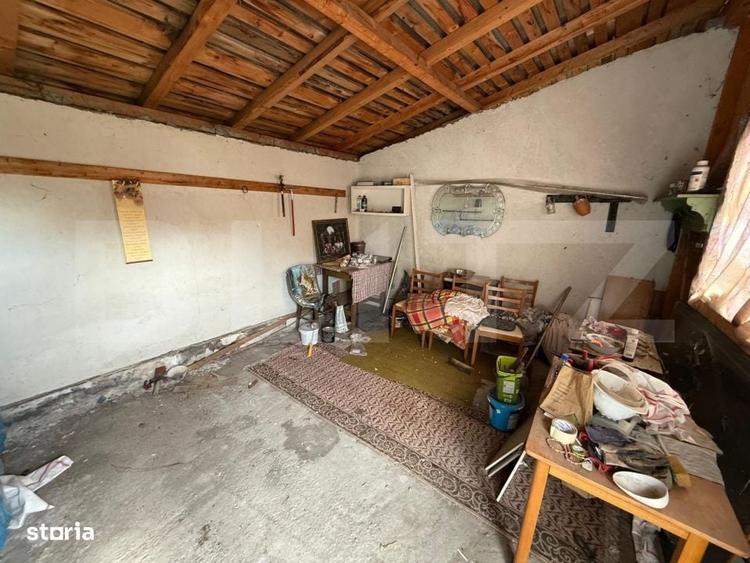 Casă cu 4 camere cu Teren 3082 Mp în Coțofenii din Față