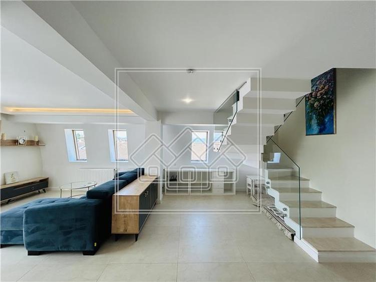 Ap pe 2 niveluri, 75 mp utili + 2 balcoane, mobilat modern - 4