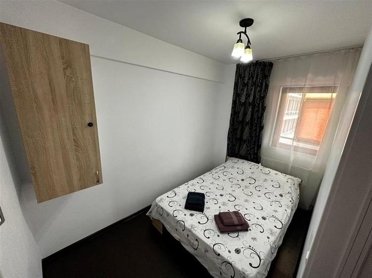 Apartament cu 2 camere semidecomandat, mobilat în Centru Civic