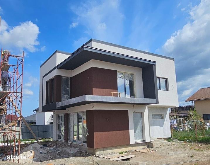 Casă cu 4 camere în Tărlungeni