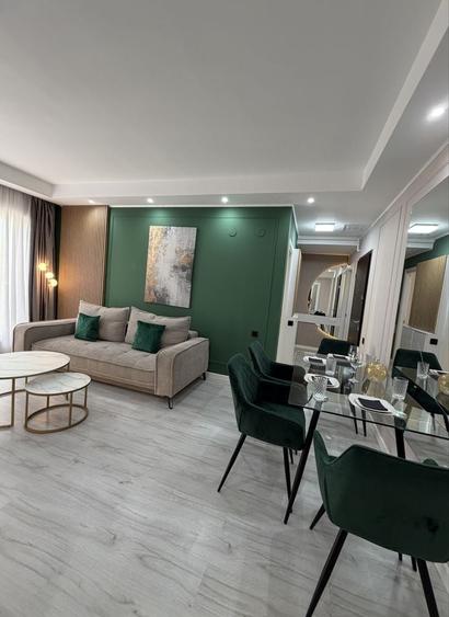 Apartament cu 3 camere decomandat în Tunari — fotografia 3