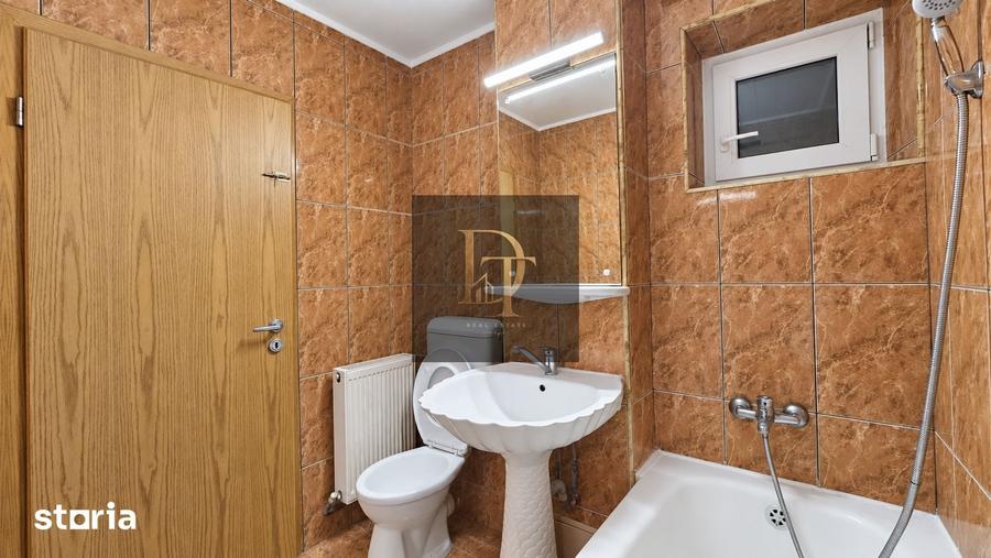 Apartament cu 3 camere decomandat în Tractorul
