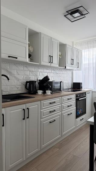 Apartament cu 2 camere semidecomandat, mobilat în Ultracentral