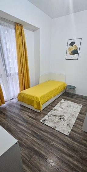 Apartament cu 3 camere semidecomandat, mobilat în 9 Mai