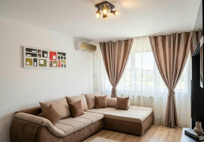 Apartament cu 2 camere semidecomandat, mobilat în Central