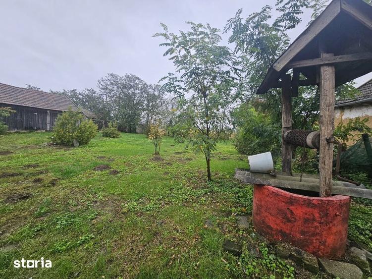 Casă cu 3 camere cu Teren 1000 Mp în Curtuișeni