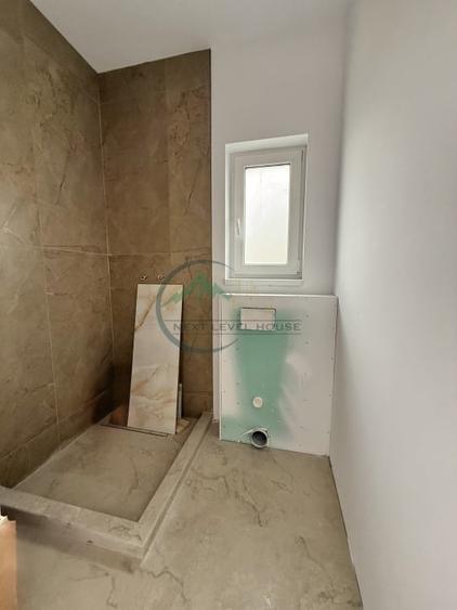 Casă individuală cu 5 camere cu Canalizare în Sânpetru