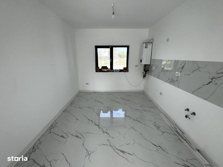 Casă cu 4 camere cu Teren 250 Mp în Bucium