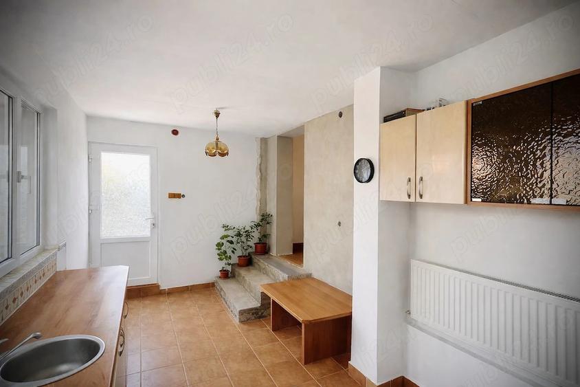 Casă cu 5 camere cu Teren 890 Mp în Miniș