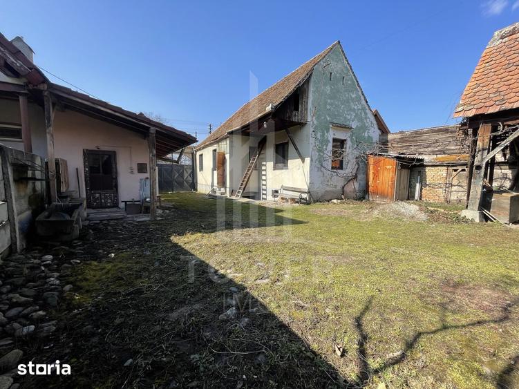 Casă cu 4 camere cu Teren 1464 Mp în Porumbacu de Jos