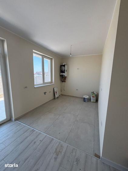 Apartament cu 3 camere în Bucovăț
