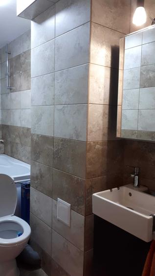 Apartament cu 2 camere decomandat în Podu Roș