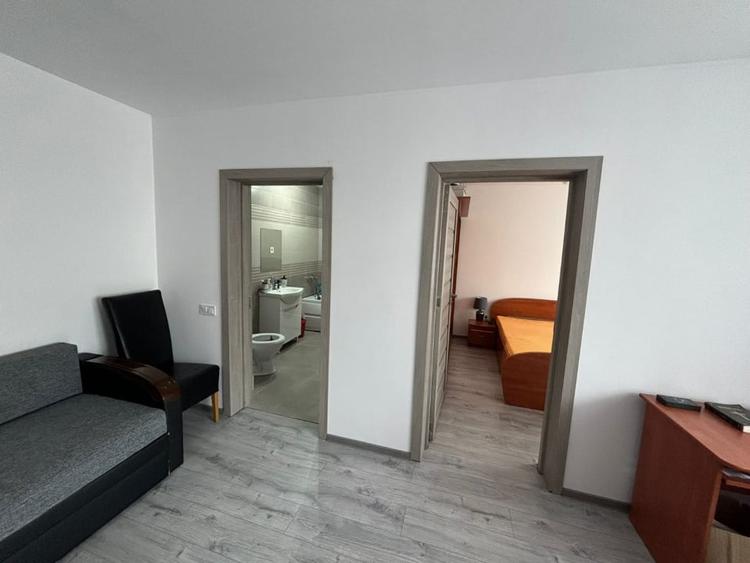 Apartament cu 2 camere semidecomandat, mobilat în Florești