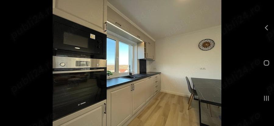 Apartament cu 3 camere decomandat în Borhanci