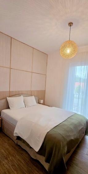 Apartament cu 2 camere decomandat în Sânmartin