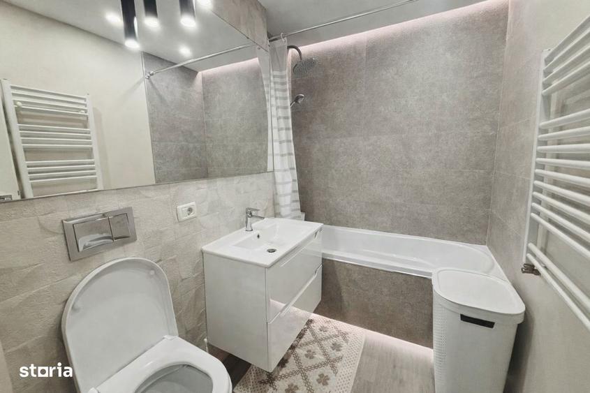 Apartament cu 2 camere semidecomandat, mobilat în Central