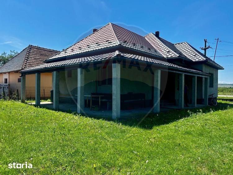Casă cu 3 camere cu Teren 1500 Mp în Pomi
