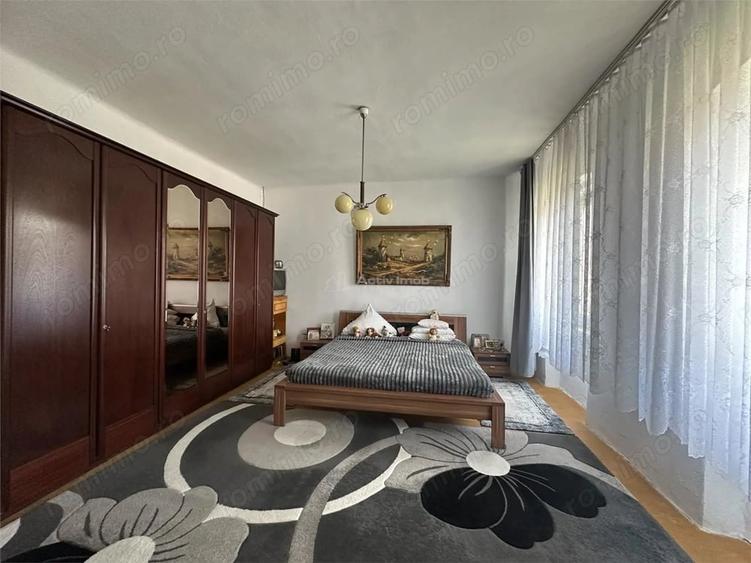 Casă cu 4 camere cu Teren 1000 Mp în Est